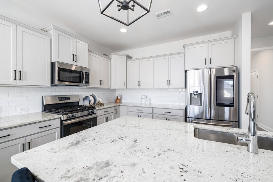 grey granite countertops in modern kitchen