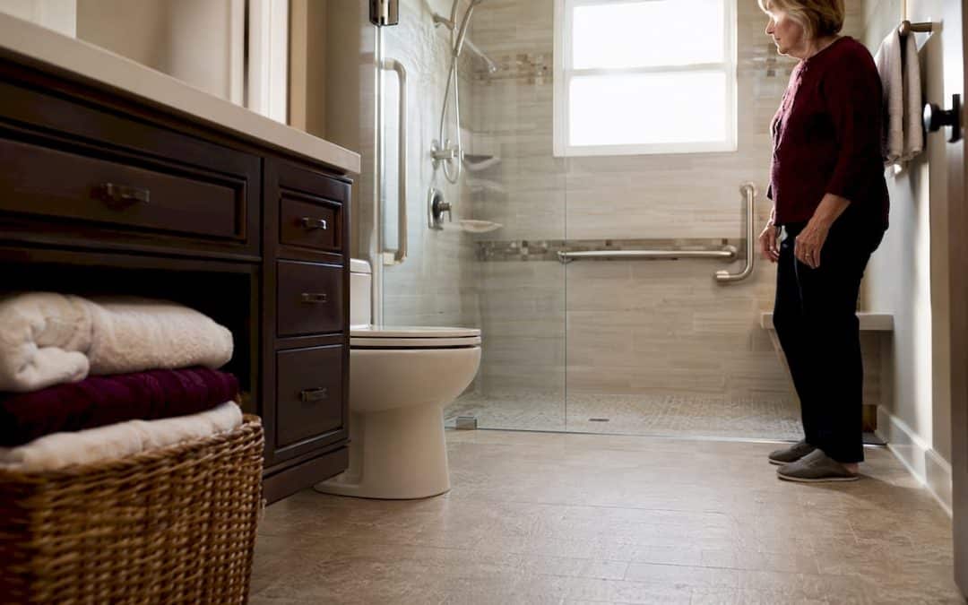 Senior woman inspecting accessible bathroom renovation