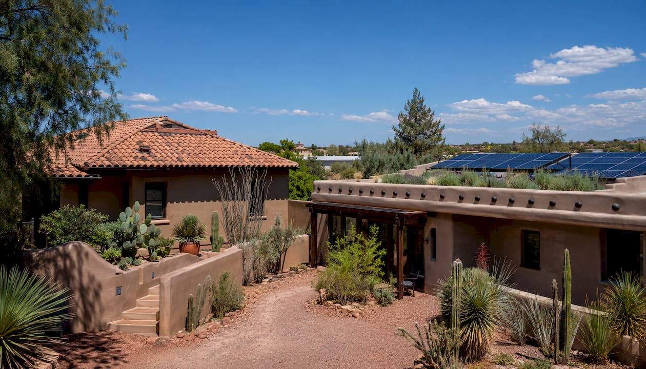 Aerial View Contrasting Flat And Pitched Roofs